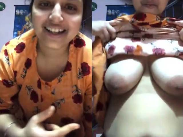 Shy Desi Bhabhi showing her big boobs on camera