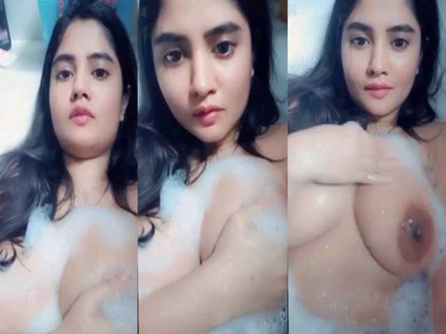 Sexy girl showing her boob from bathtub